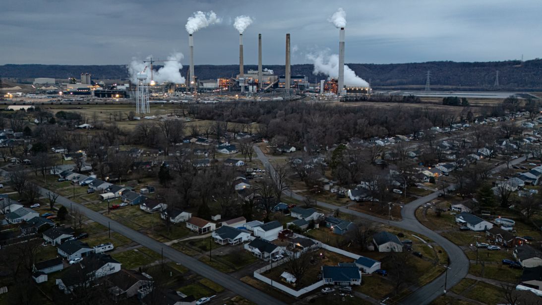 The Mill Creek Generating Station, a coal-fired power plant, hovers over a Louisville neighborhood on February 14, 2026.