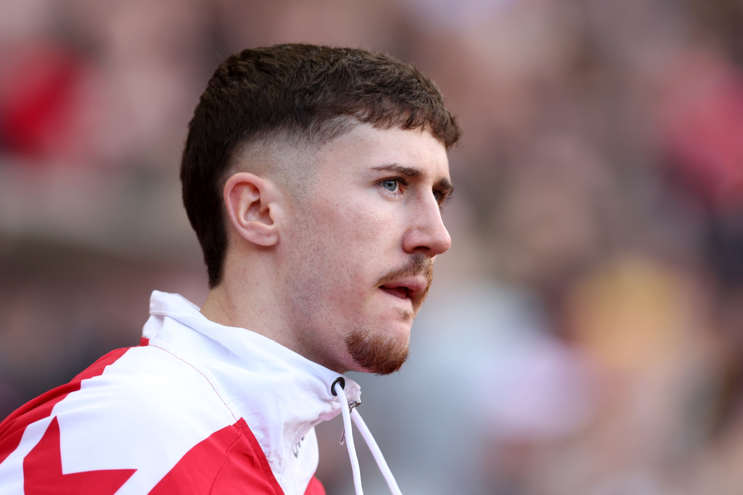 SUNDERLAND, ENGLAND - FEBRUARY 22: Trai Hume of Sunderland leads the team on to the field prior to the Premier League match between Sunderland and Fulham at Stadium of Light on February 22, 2026 in Sunderland, England. (Photo by George Wood/Getty Images)