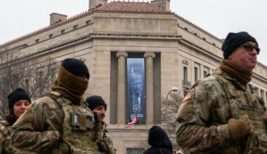 US justice department hangs banner of Donald Trump at headquarters