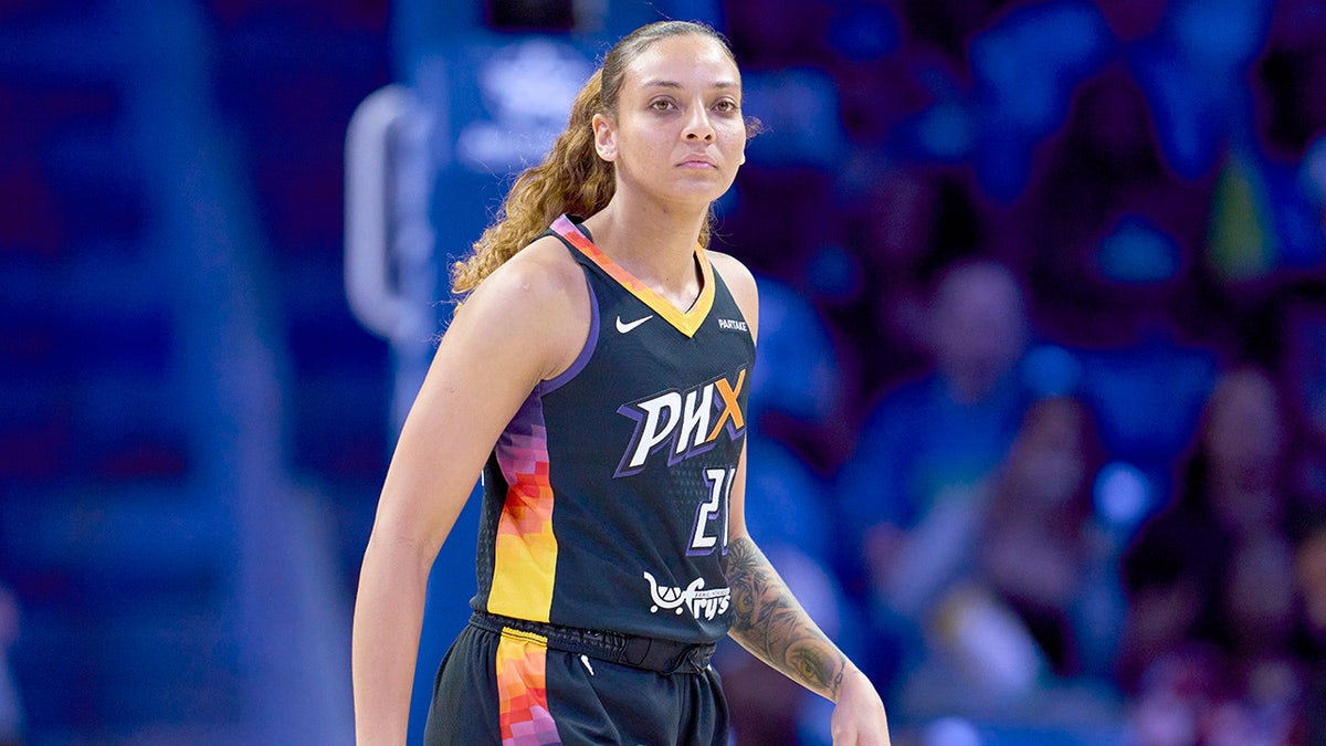 Mikiah Herbert looks on