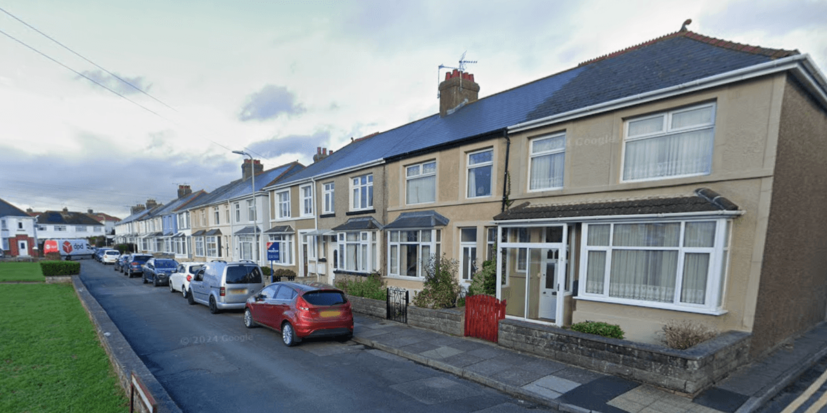 Man, 60, charged after elderly woman's body found in freezer in seaside town