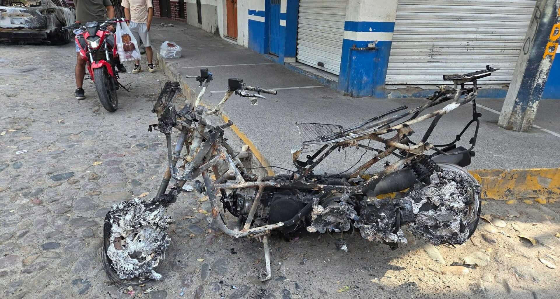 The aftermath of a cartel show of 'force' in Puerto Vallarta