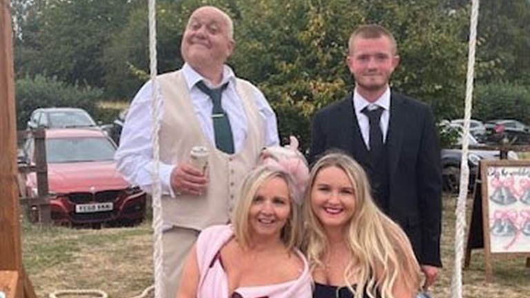 Mark Ashley (back left) with his family. Pic: PA