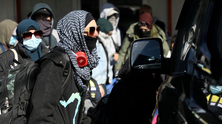 Families departing on Monday, believing they were being repatriated. Pic: AP