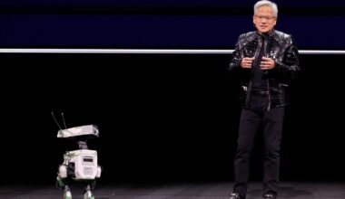 Nvidia chief executive Jensen Huang is joined onstage by a robot at the annual consumer electronics trade show. Pic: Reuters