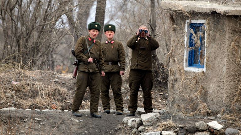 North Korean soldiers guard the border near Sinuiju in 2010. Pic: Reuters