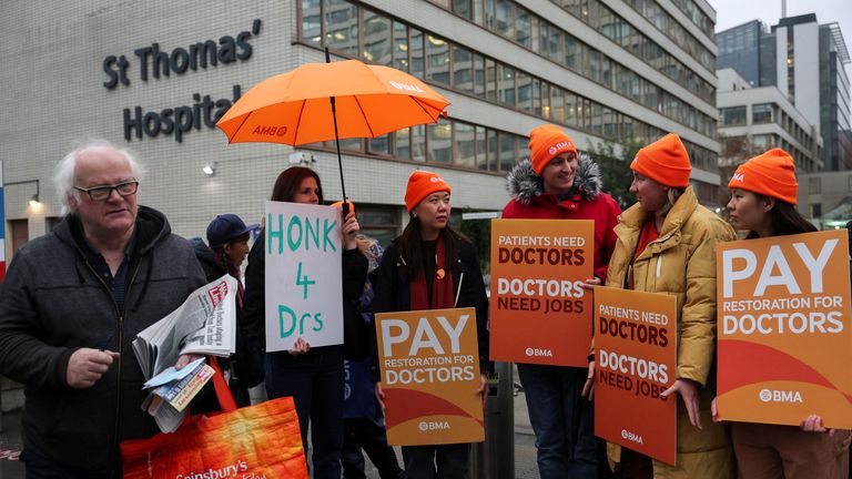 Resident doctors protest outside St Thomas' Hospital. Pic: Reuters