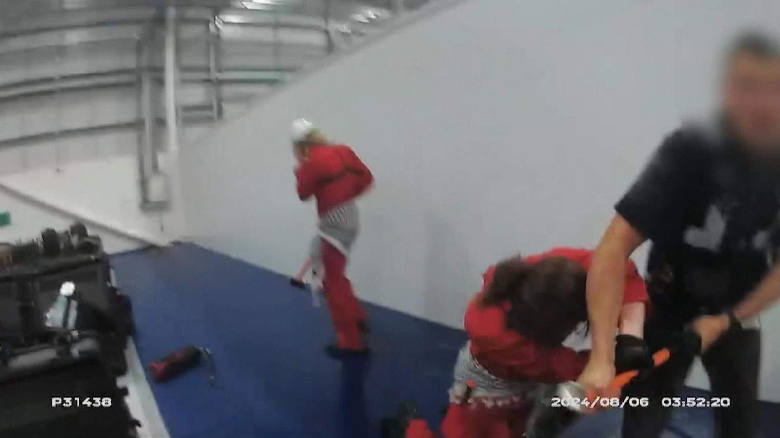 Police bodycam footage during the break-in