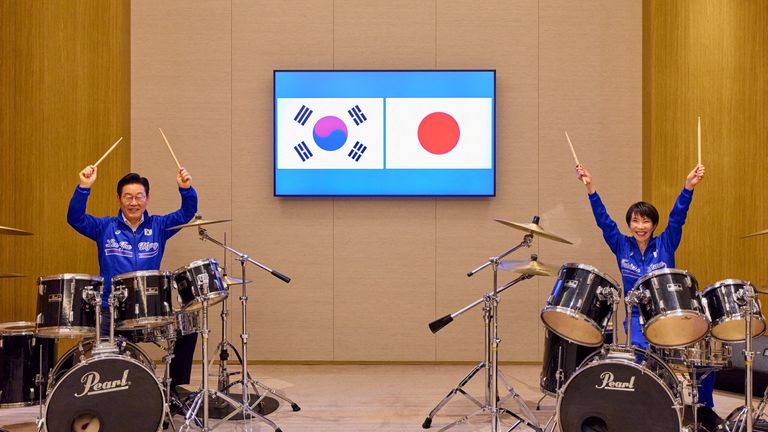 Ms Takaichi playing the drums with South Korean President Lee Jae-myung. Pic: Reuters