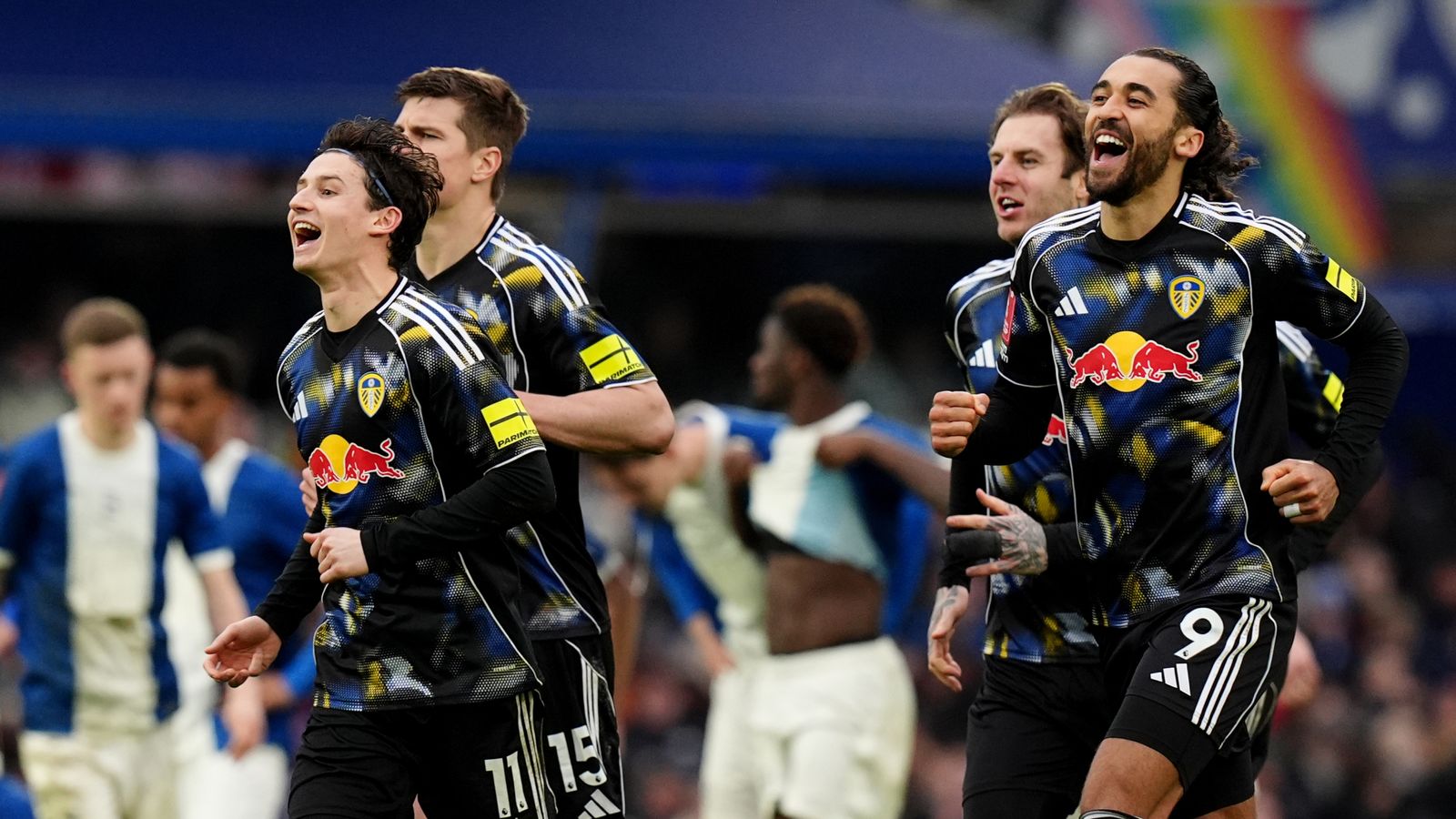 Leeds players celebrate after winning their FA Cup fourth round tie against Birmingham City on penalties
