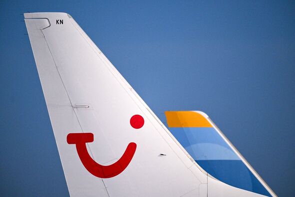 A Tui logo on the tail of a plane
