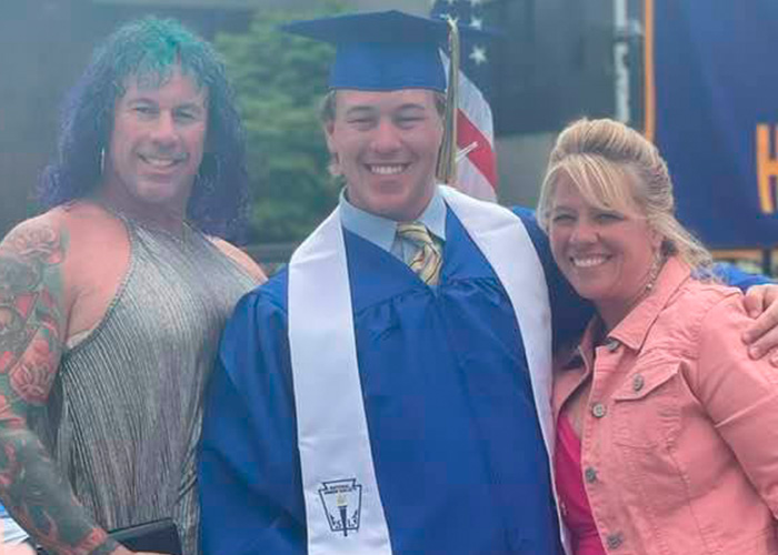 Young graduate smiling with family members, highlighting police discovery about ice rink attacker’s family background. Young graduate smiling with family members, highlighting police discovery about ice rink attacker’s family background.