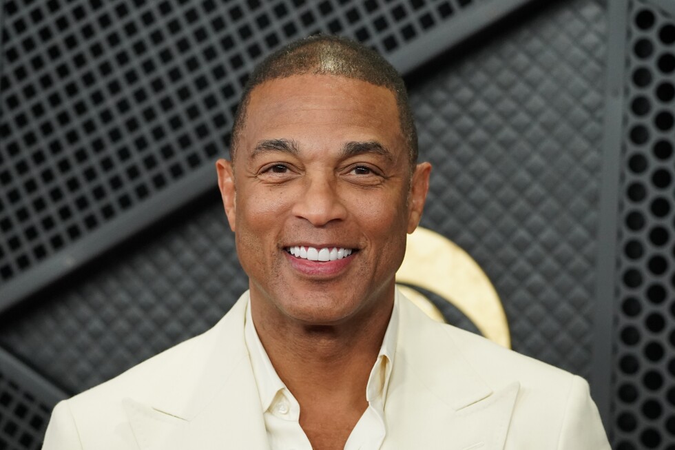 Don Lemon says a dozen agents were sent to arrest him