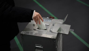 Hawkish Japanese prime minister hopes for big win as polls open