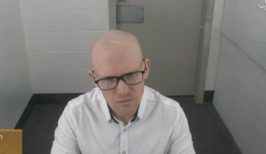 New Zealand mosque shooter seeks to discard his guilty pleas, saying prison made him irrational