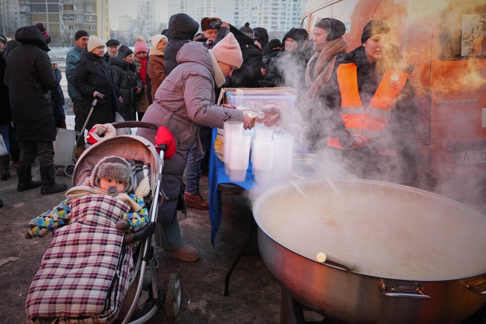 A Kyiv mother struggles to keep her children warm and fed amid power outages