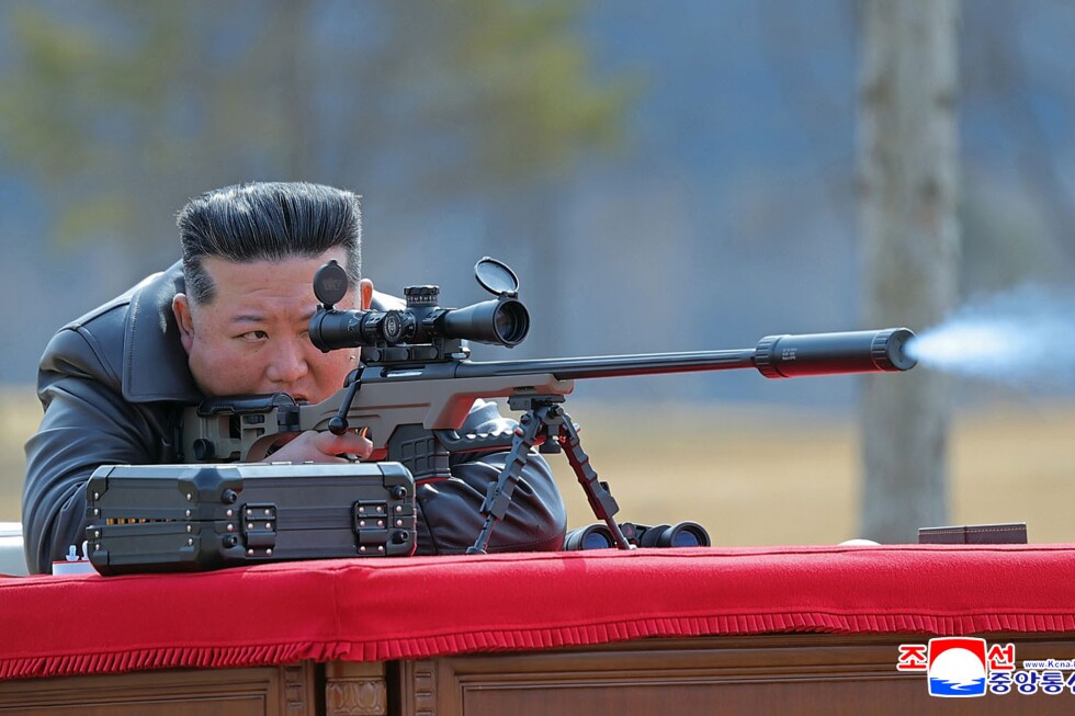 North Korea’s Kim gifts rifles to top officials after party congress