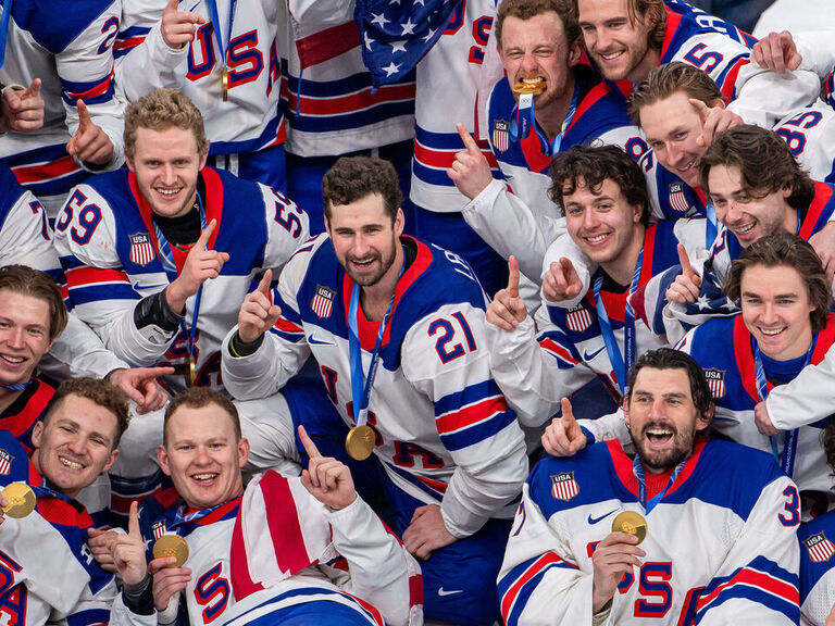 Team USA beats Canada in OT to win men's hockey gold
