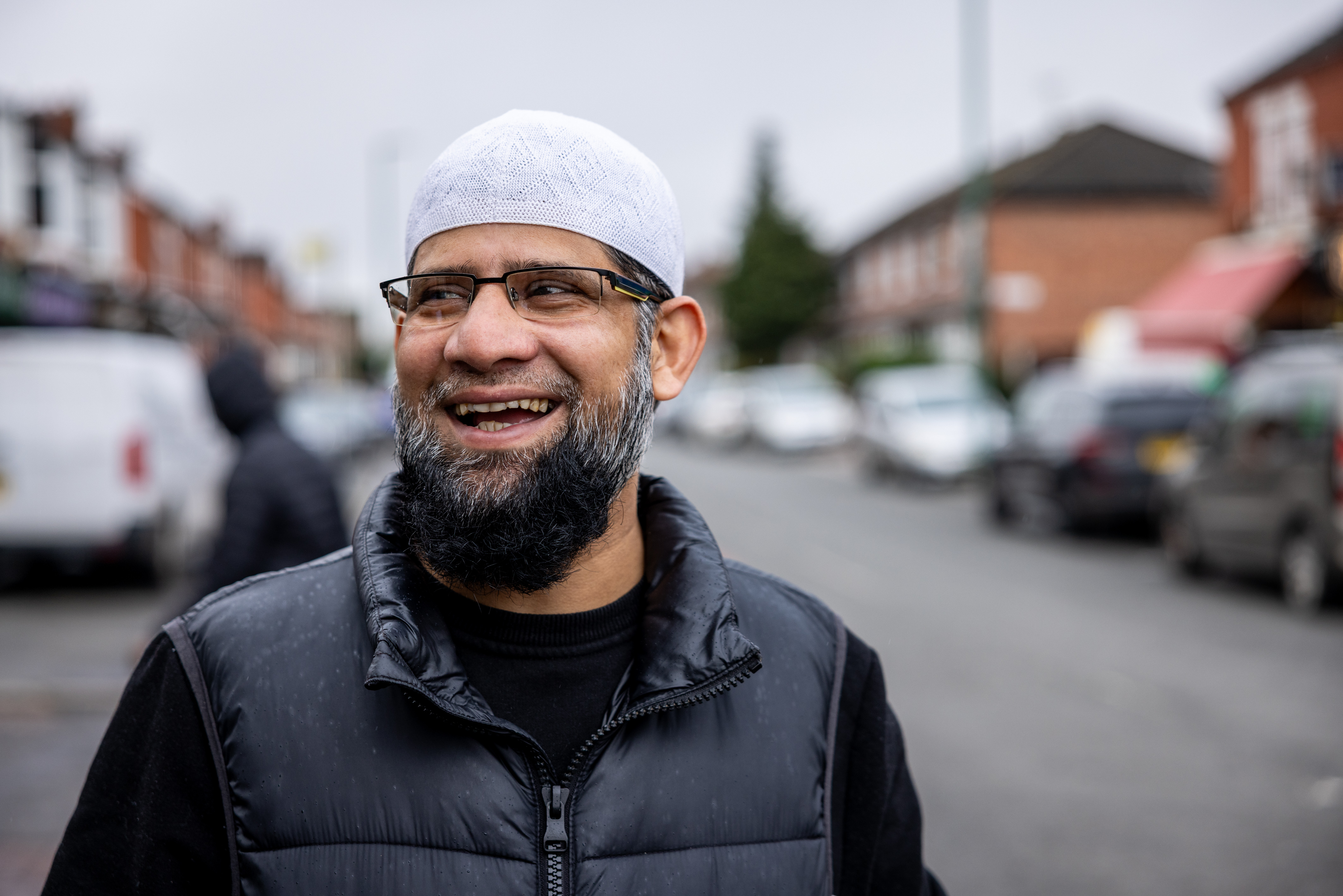Fosel Mih, 45, smiling in Gorton, Gtr Manchester.