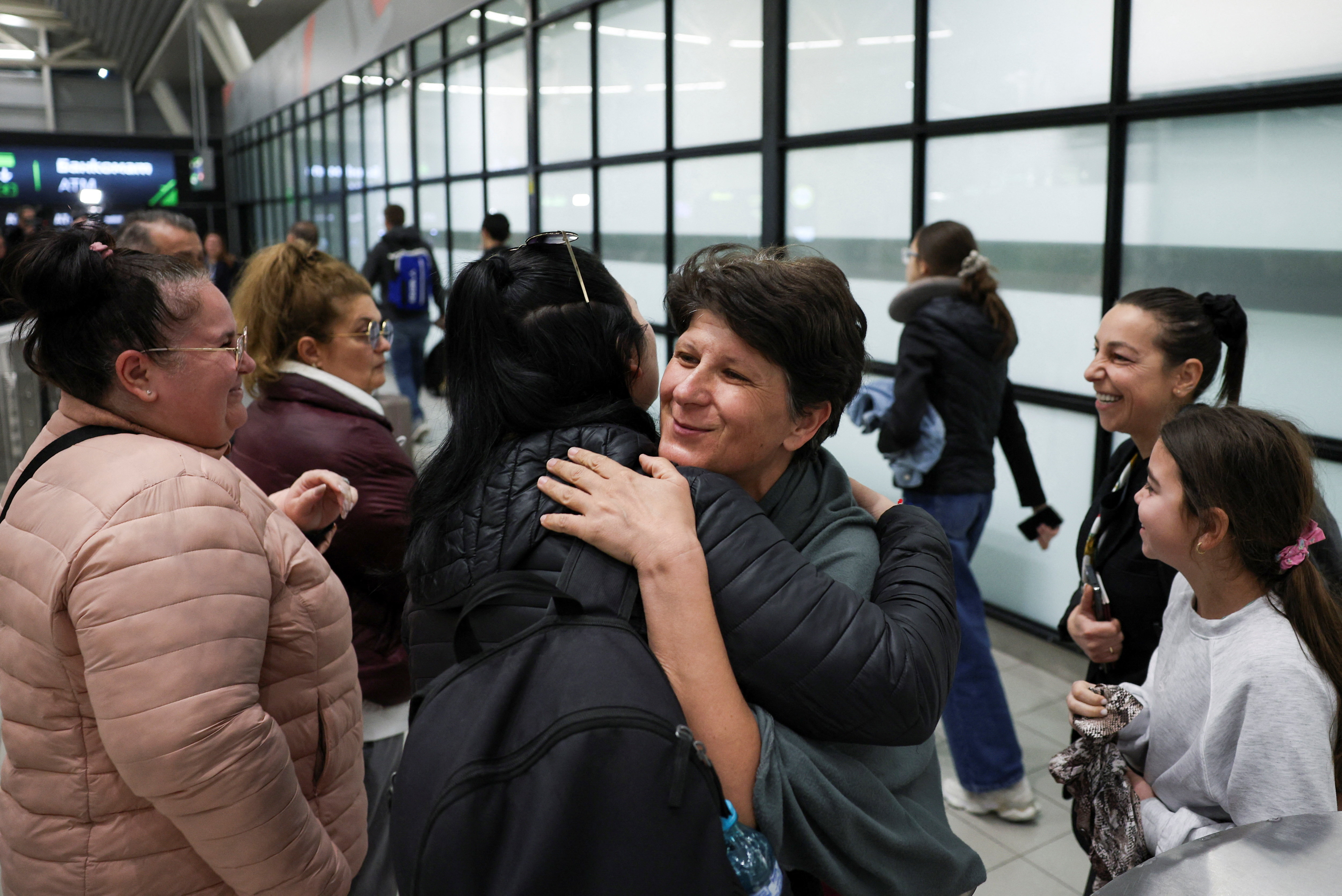 People who were stranded in Dubai, amid the U.S.-Israel conflict with Iran, arrive at Sofia Airport