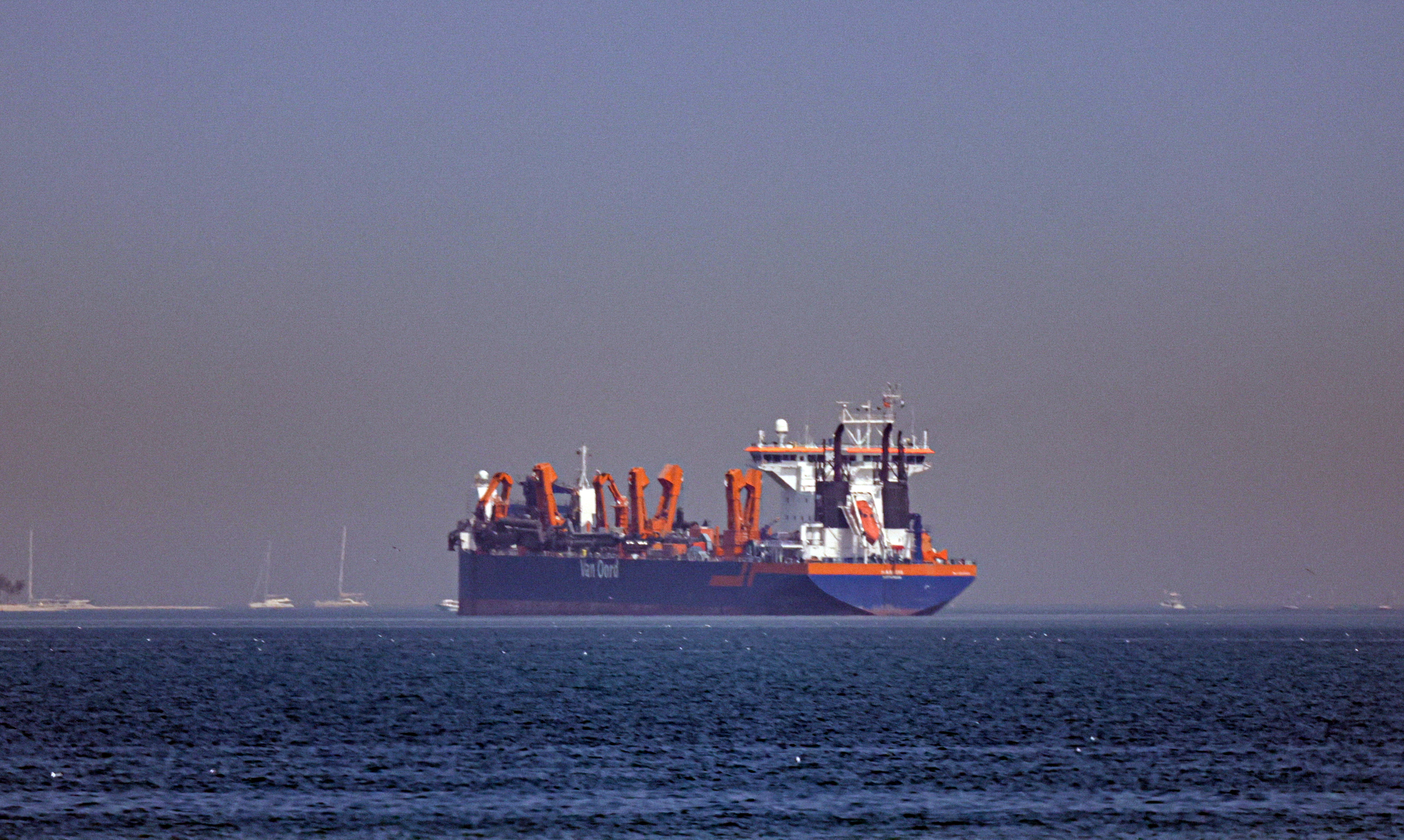 A vessel anchors off the coast of Dubai, UAE.