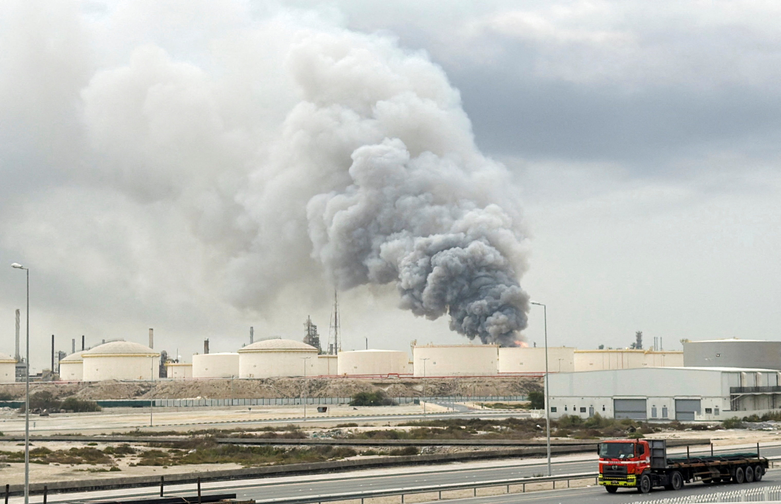 Smoke rising following a strike on the Bapco Oil Refinery on Sitra Island, Bahrain.