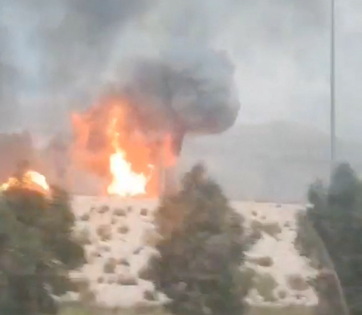 Smoke and flames rise from the South Pars gas field following an Israeli strike