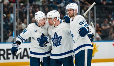 Jan 31, 2026; Vancouver, British Columbia, CAN; Toronto Maple Leafs defenseman Troy Stecher (28) and forward Max Domi (11) and defenseman Oliver Ekman-Larsson (95) celebrate Domi’s goal against the Vancouver Canucks in the third period at Rogers Arena. Mandatory Credit: Bob Frid-Imagn Images