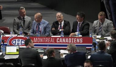 Jul 8, 2022; Montreal, Quebec, CANADA; General view of the Montreal Canadiens table during the second round of the 2022 NHL Draft at the Bell Centre. Montreal Canadiens head coach Martin St-Louis and General Manager Kent Hughes on the left. Mandatory Credit: Eric Bolte-Imagn Images