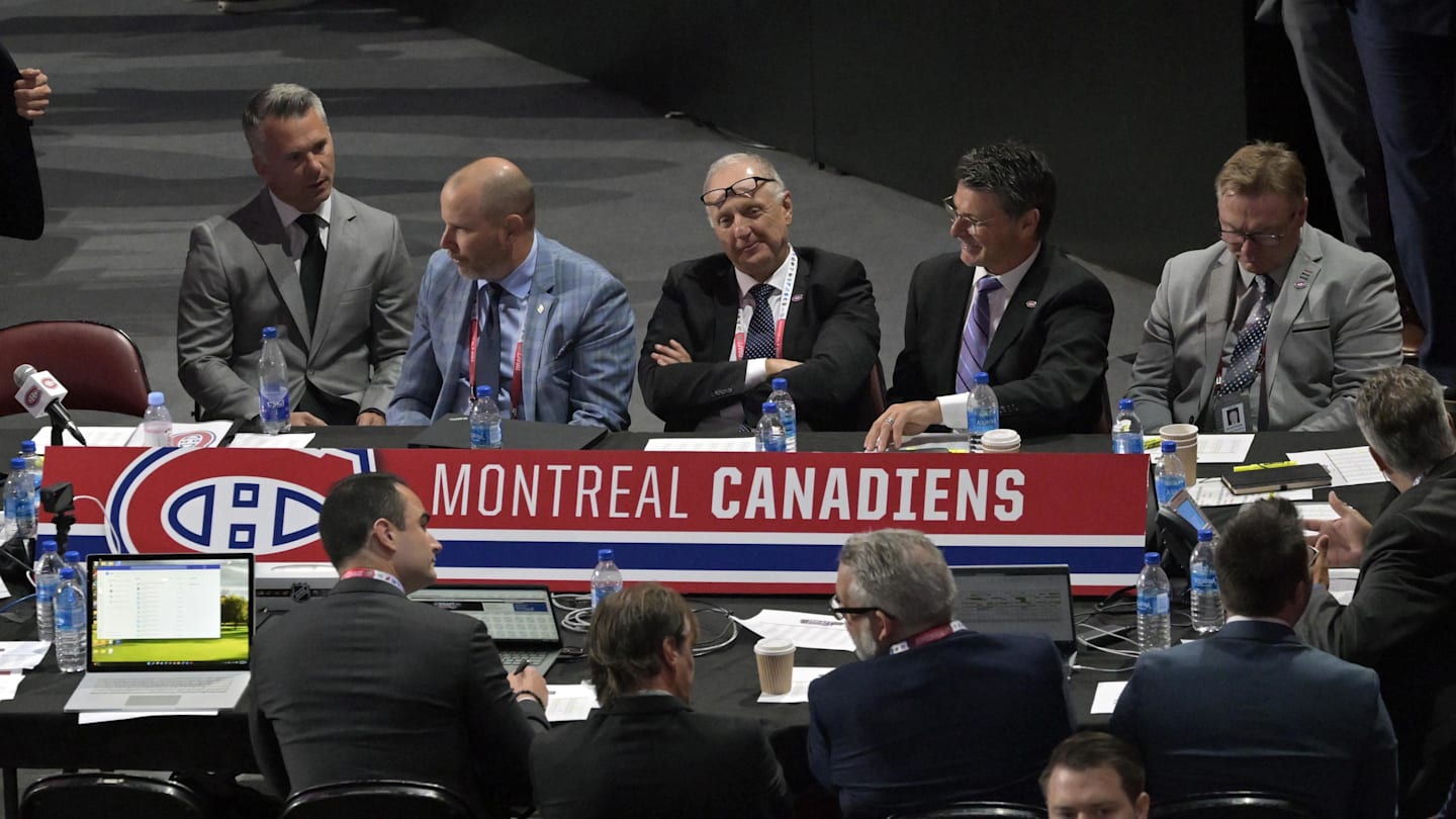 Jul 8, 2022; Montreal, Quebec, CANADA; General view of the Montreal Canadiens table during the second round of the 2022 NHL Draft at the Bell Centre. Montreal Canadiens head coach Martin St-Louis and General Manager Kent Hughes on the left. Mandatory Credit: Eric Bolte-Imagn Images