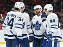 Auston Matthews, William Nylander and Morgan Rielly of the Toronto Maple Leafs talk before a power play earlier this season.