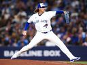 Kevin Gausman of the Toronto Blue Jays pitches in the second inning of his team's MLB game against the Athletics at Rogers Centre on March 27, 2026 in Toronto.