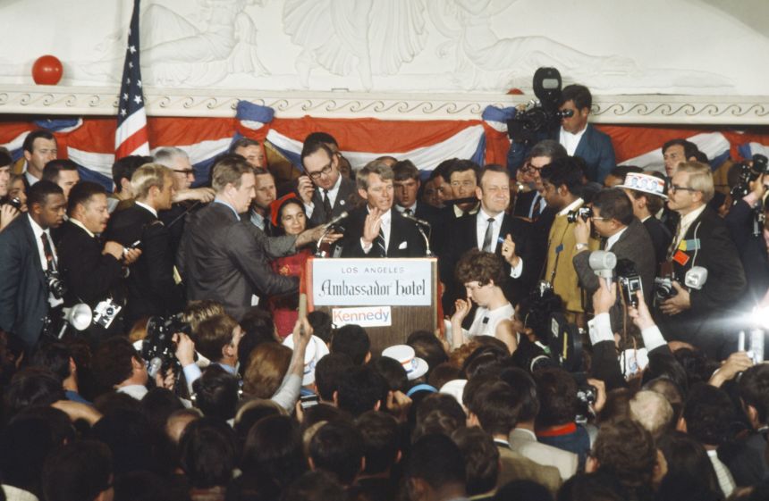 Sen. Robert F. Kennedy delivers a speech before he was fatally shot on June 5, 1968, at the Ambassador Hotel in Los Angeles. Dolores Huerta stands on the left.