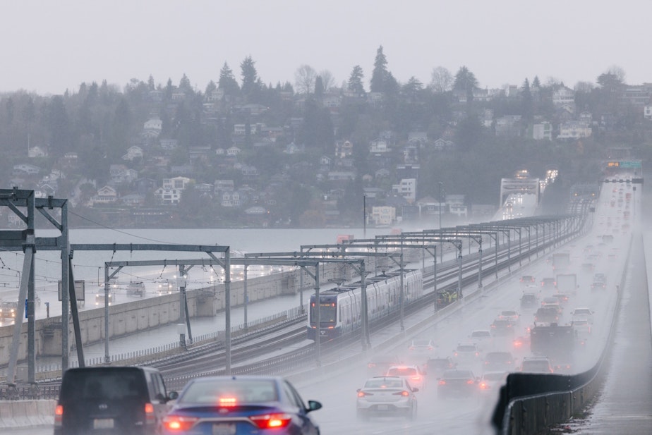 caption: A Crosslake Connection train crosses I-90 linking Seattle and Bellevue during a practice run in December of 2025 (before the line opened to the public).