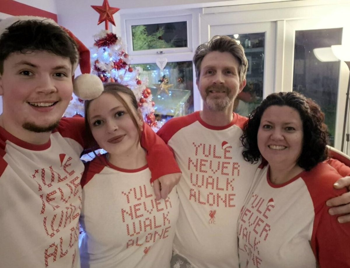 Aaron Mills, 18, pictured with his family at Christmas