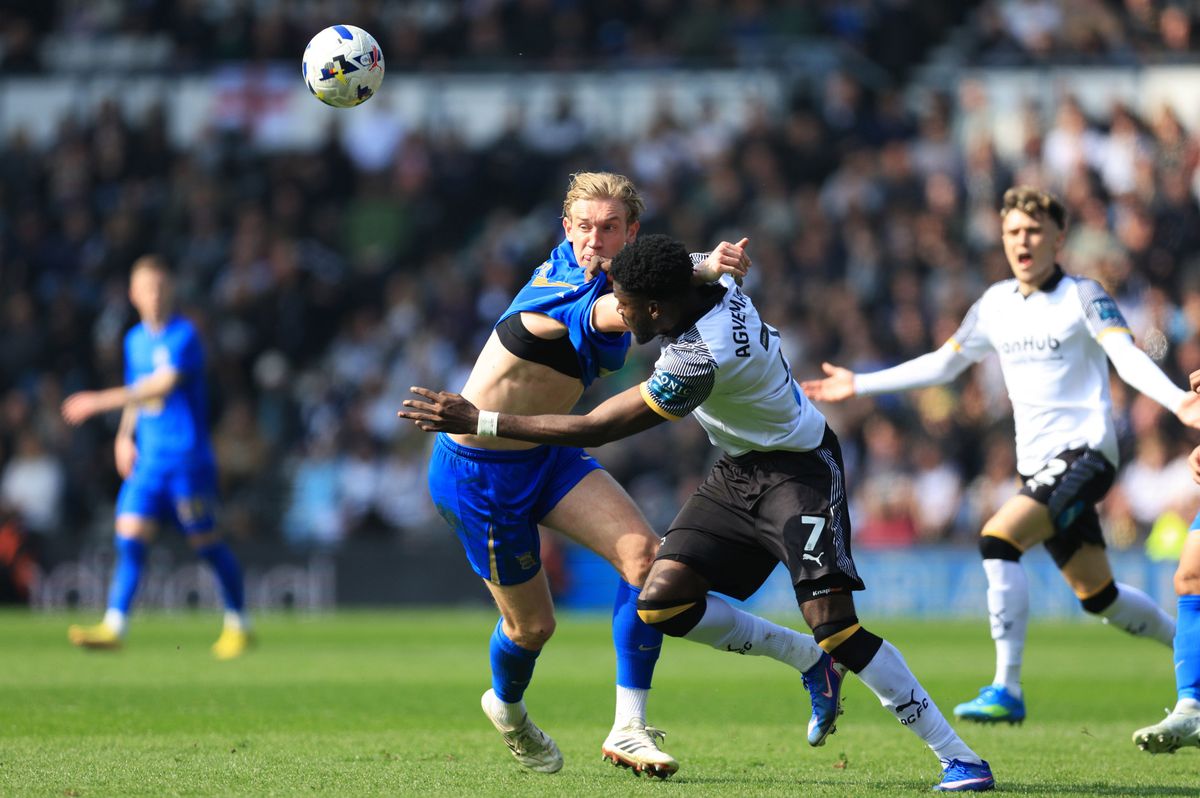 Birmingham City's Christoph Klarer (left) and Derby County's Patrick Agyemang battle for the ball