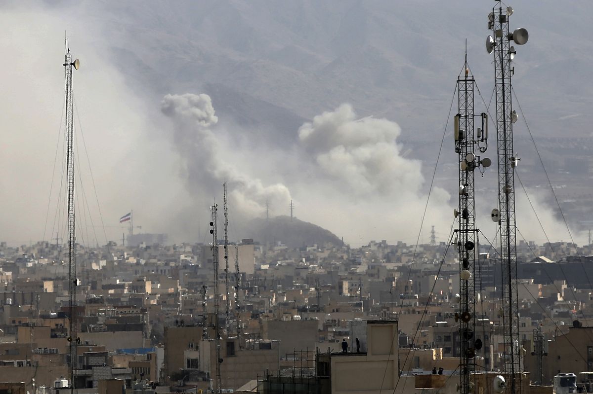 Smoke rises over the city center after an Israeli army launches 2nd wave of airstrikes on Iran 