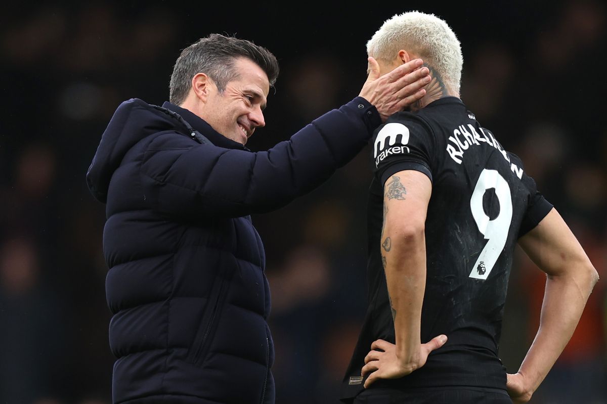 Marco Silva and Richarlison talk after the Premier League match between Fulham and Tottenham Hotspur at Craven Cottage