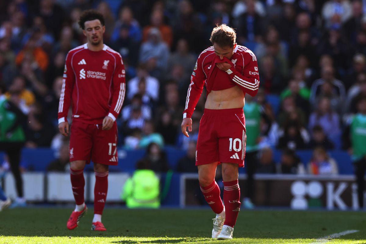 BRIGHTON, ENGLAND - MARCH 21: A dejected looking Alexis Mac Allister and Curtis Jones of Liverpool during the Premier League match between Brighton & Hove Albion and Liverpool at Amex Stadium on March 21, 2026 in Brighton, United Kingdom. (Photo by Shaun Brooks - CameraSport via Getty Images)
