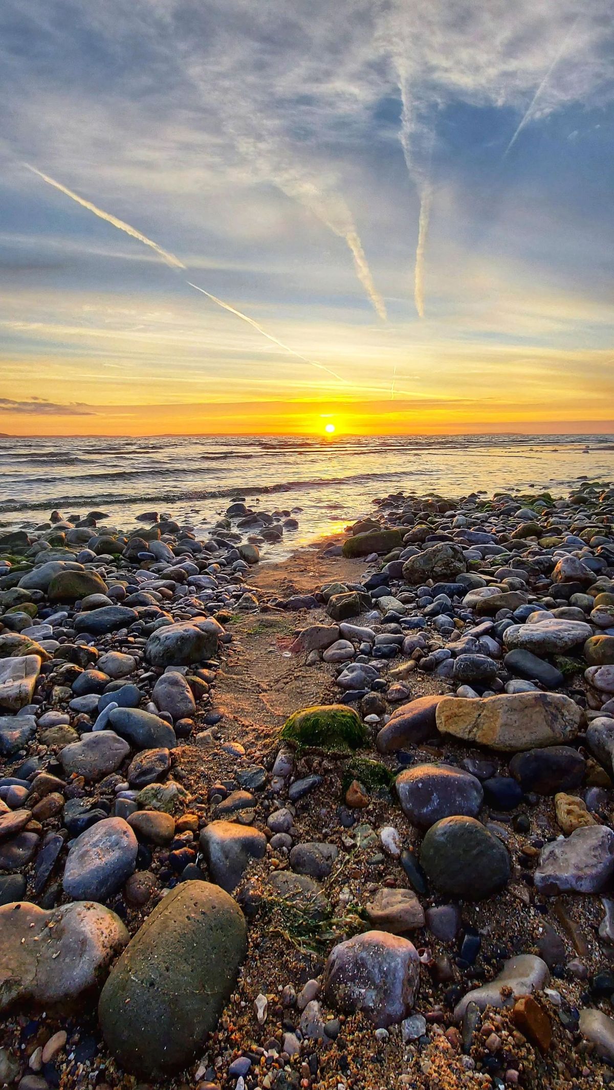 Sunset on Llandudno's West Shore beach, Conwy county. Picture: @craigmiddleton895/Instagram