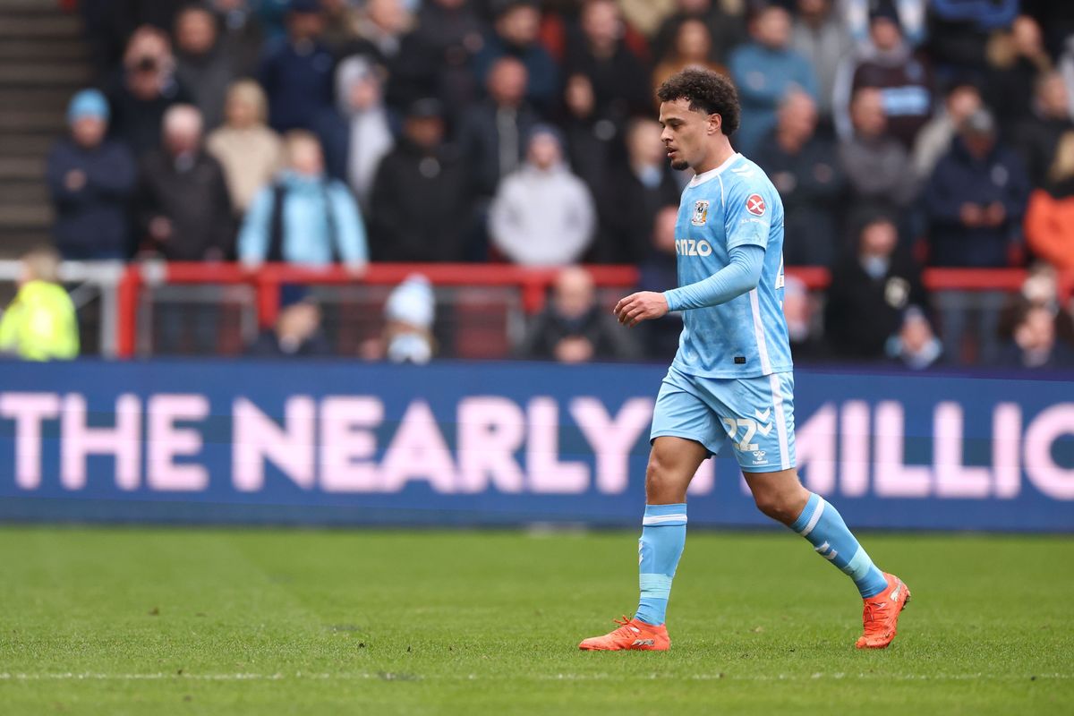 Joel Latibeaudiere of Coventry City leaves the field after his red card