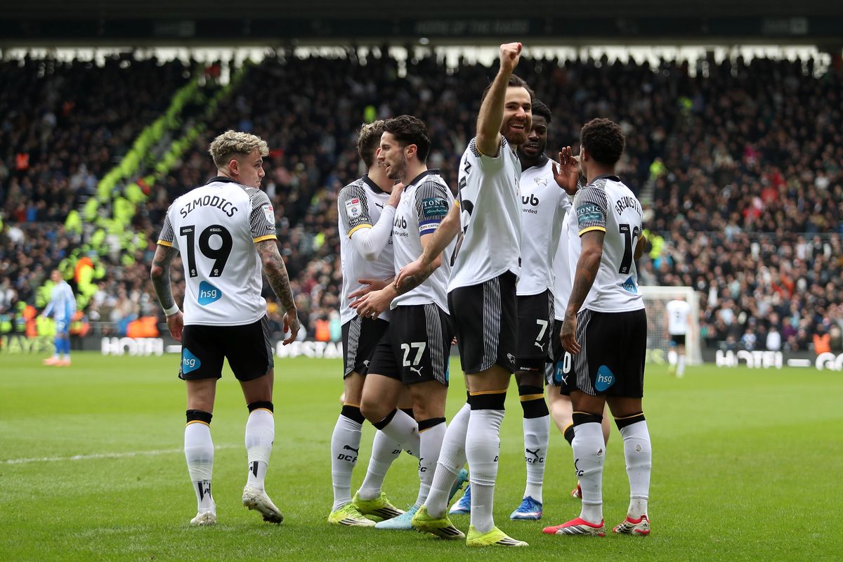 Derby County's Ben Brereton Diaz (centre right) celebrates scoring his sides first goal with team mates during the Sky Bet Championship match at Pride Park Stadium, Derby. 