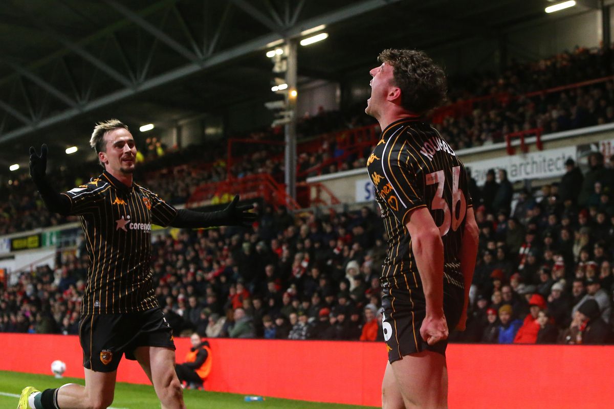 Lewis Koumas celebates with Liam Millar at Wrexham