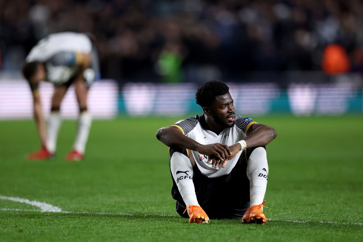 Derby County's Patrick Agyemang reacts at the full time whistle after the defeat to Millwall.