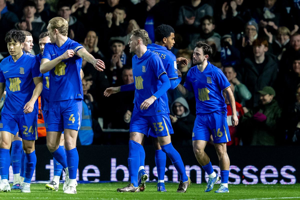 Birmingham City midfielder Patrick Roberts (right) celebrates his goal against QPR
