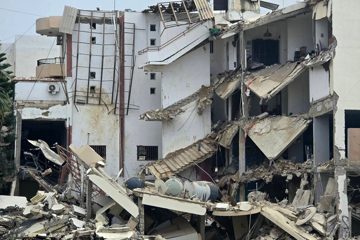 This photograph shows the destruction after an Israeli airstrike that targeted the southern coastal city of Tyre's Al Hosh neighborhood, on March 19, 2026. Lebanon was drawn into the Middle East war on March 2 when militant group Hezbollah launched rockets towards Israel to avenge the killing of Iran's supreme leader Ayatollah Ali Khamenei. Israel responded with intense strikes on Lebanon that have killed at least 968 people and displaced over a million, according to local authorities, and by launching ground operations in the south. (Photo by KAWNAT HAJU / AFP via Getty Images)