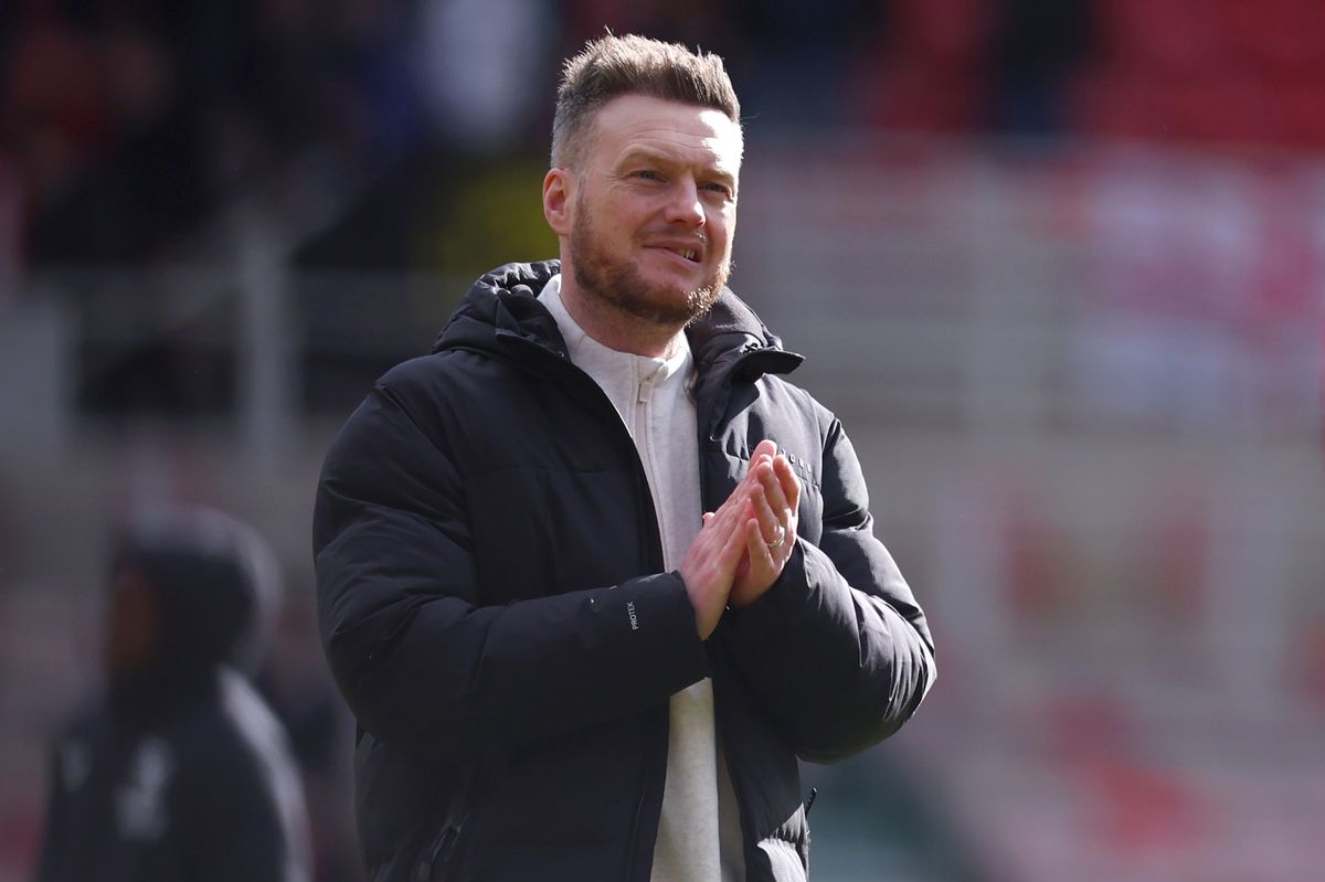 Middlesbrough head coach Kim Hellberg applauds the fans
