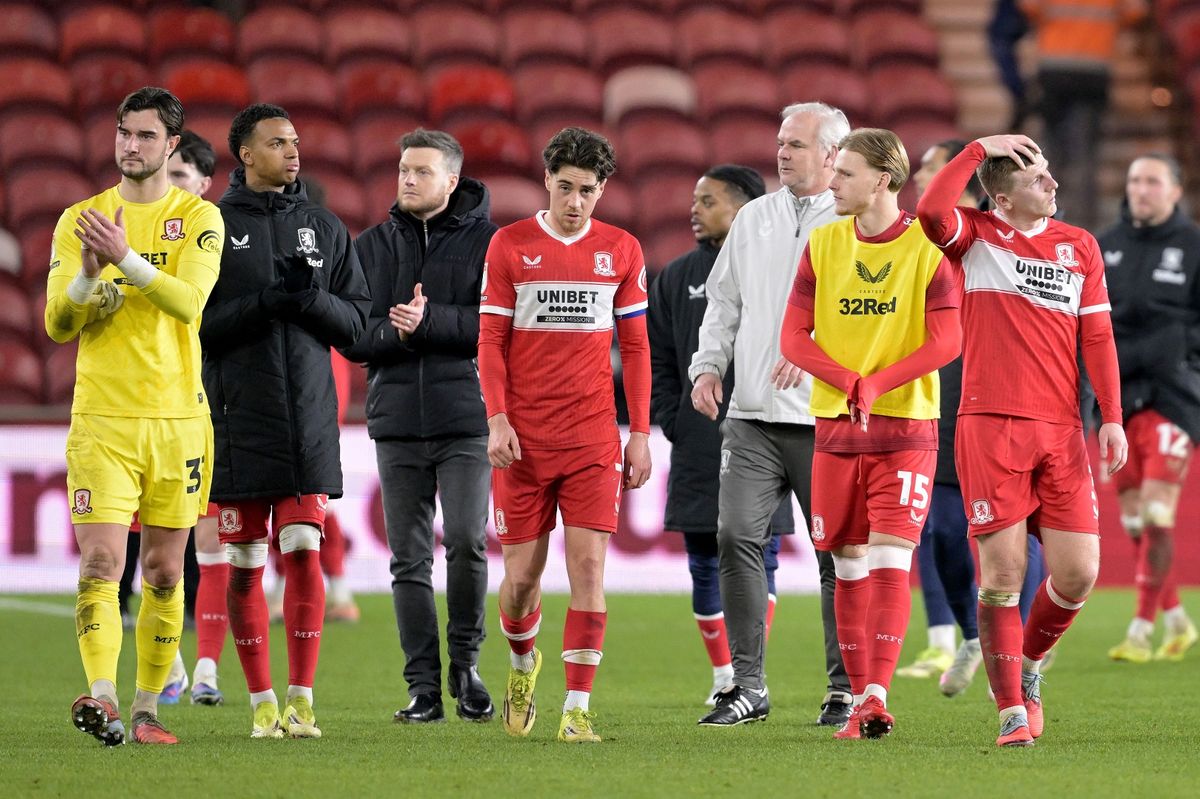 Hayden Hackney, head coach Kim Hellberg, Matt Targett and Goalkeeper Sol Brynn look dejected