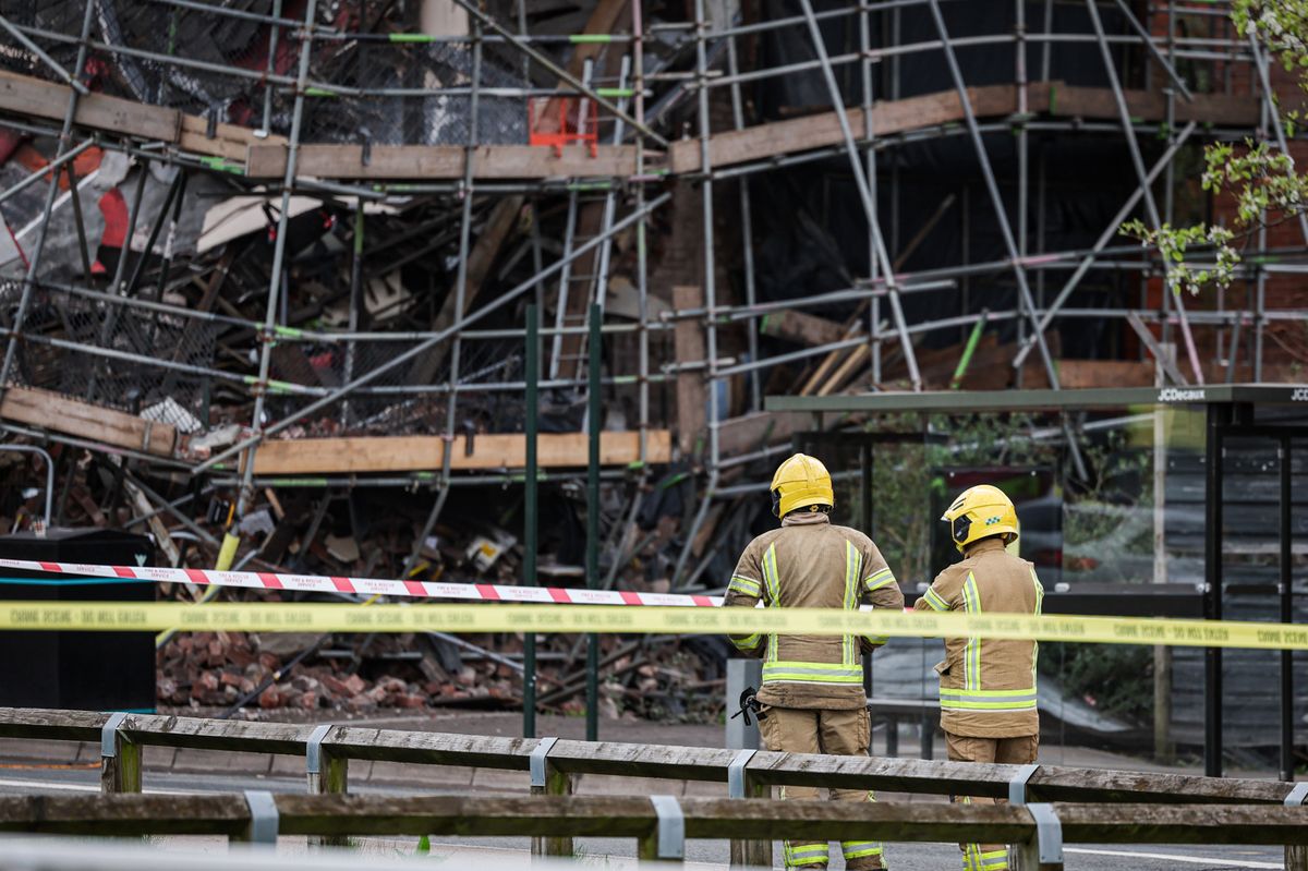 Emergency services at the scene where a building collapsed on King Street, Oldham
