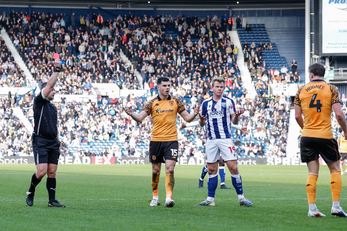 Hull City's Charlie Hughes is sent off by referee Josh Smith at West Brom